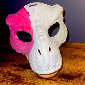Hand painted dinosaur mask. Adjustable chin and head straps.